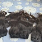 WEFTED HUMAN HAIR