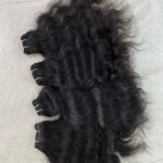 WEFTED HUMAN HAIR